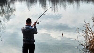 Fisherman,Trying,To,Do,A,Perfect,Cast,,Throwing,Lure.,Spining